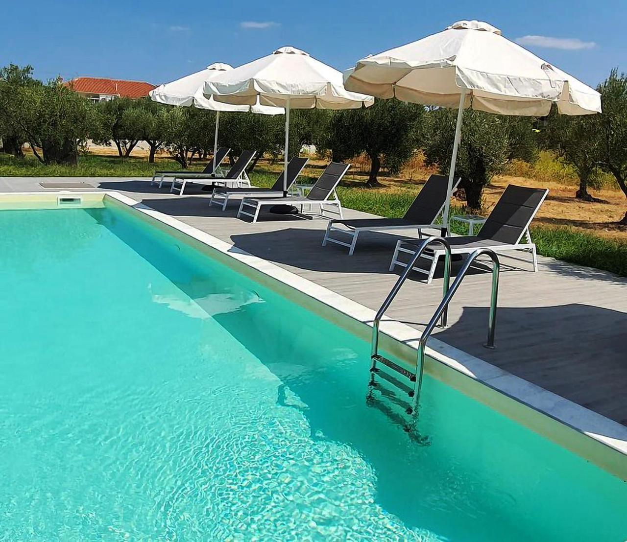 Eleonas Suites Sarti Bagian luar foto